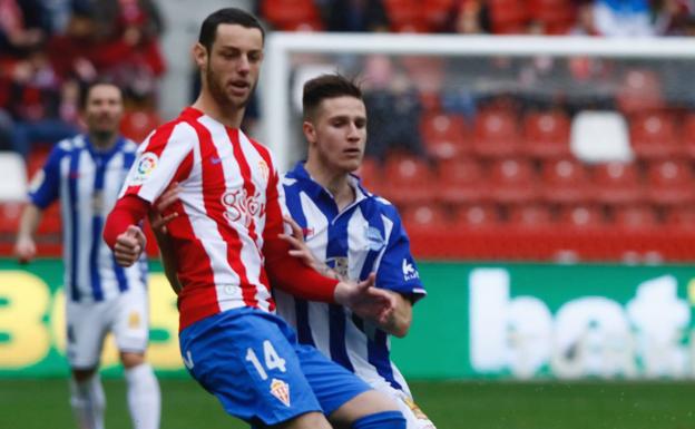 Burgui, junto a Vigaray, la pasada temporada, en El Molinón.