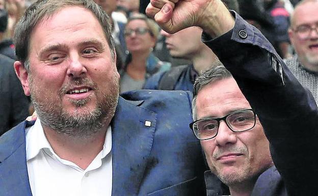 Oriol Junqueras, el pasado septiembre con Josep Maria Jové./REUTERS