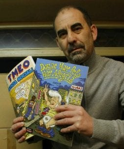 El dibujante Kini, con las novedades del TMEO. / J. MONTES/