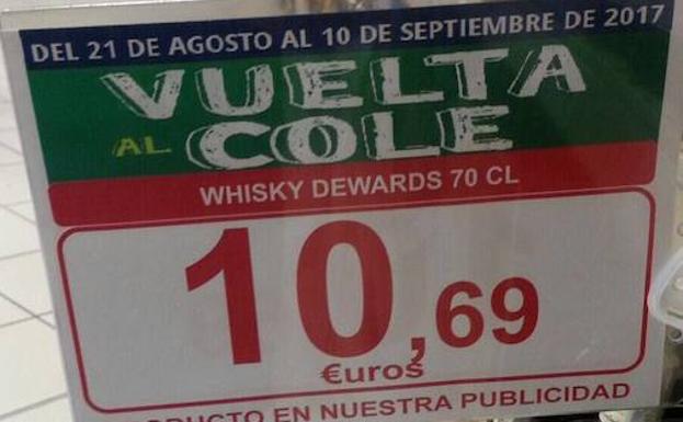 Alcampo retira el cartel que anunciaba una oferta de whisky para la vuelta al cole