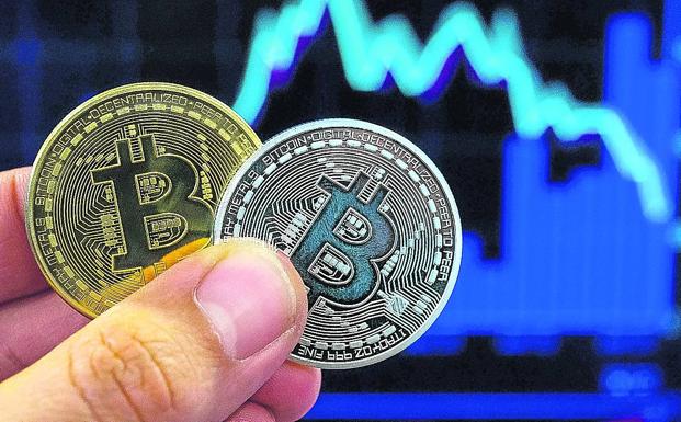 Bitcoin, la moneda virtual que promete volverte rico: ¿merece la pena invertir?