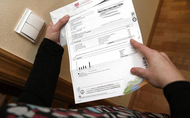 A consumer analyzes his electricity bill. 