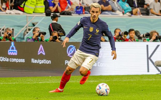 Griezmann drives the ball in the quarterfinal match against England. 