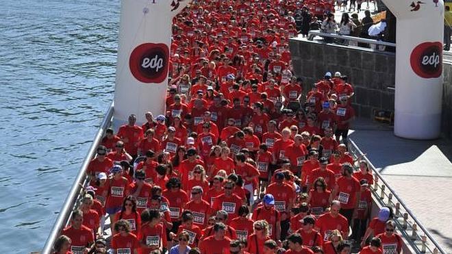 Marea roja de solidaridad sobre la ría